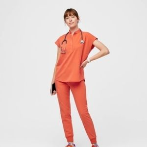 Figs scrubs sunset orange XS top and SM bottoms